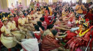 Kolkata: Devotees seeking blessings by touching feet of 'Kumari Kanya' (young girls) on the occasion of Ram Navami at Dakshineswar Ramkrishna Sangha Adyapeath, Dakshineswar, in Kolkata on Wednesday. More than 2000 girls participated in the Hindu festival that is observed after a nine days long fasting ritual. PTI Photo(PTI4_5_2017_000026B)